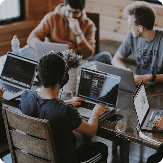 The Qaltivate team working together around a table